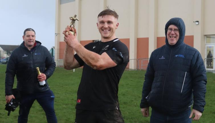 A delighted Tom Hughes with Gareth Scourfield and Stephen Thornton